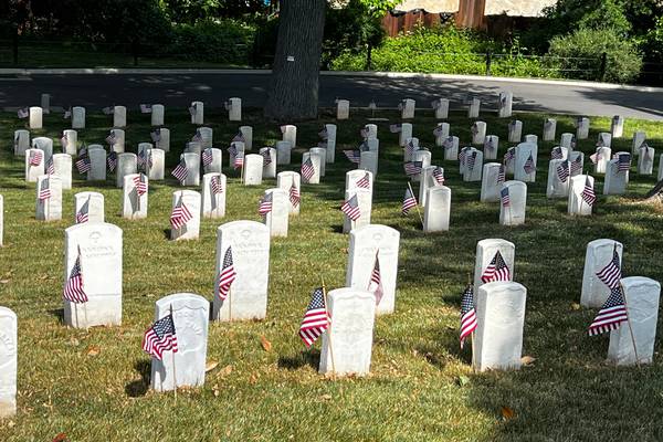 Photos: Community members place flags at Alexandria National Cemetery for Memorial Day