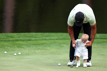 People golfing at Augusta National
