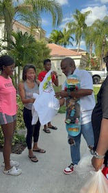 WHQT WEDR Hot 105 99Jamz Holiday Food Drop-Off Caravan