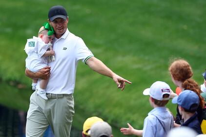 People golfing at Augusta National