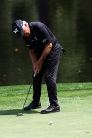 People golfing at Augusta National