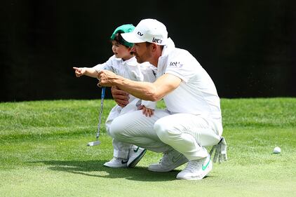 People golfing at Augusta National