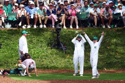 People golfing at Augusta National