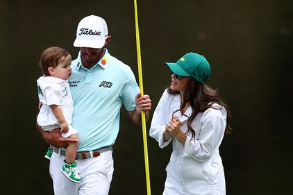 People golfing at Augusta National