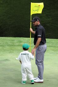 People golfing at Augusta National