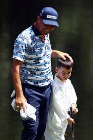 People golfing at Augusta National