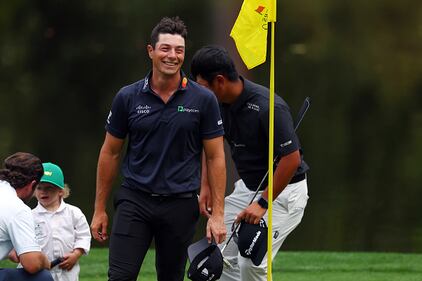 People golfing at Augusta National