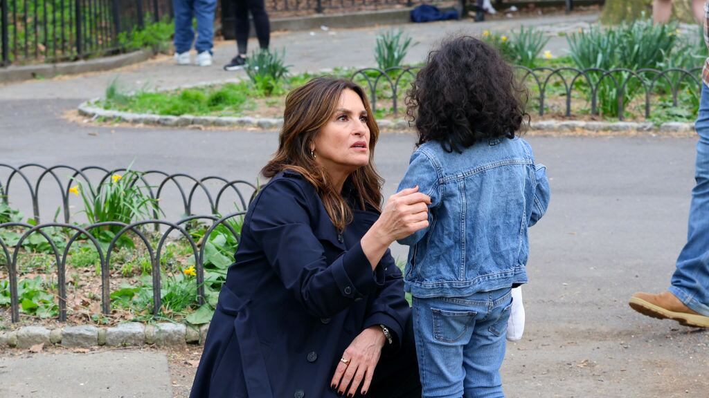 Mariska Hargitay is seen kneeling talking to a child who was really lost in a New York City park.