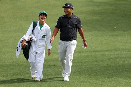 People golfing at Augusta National